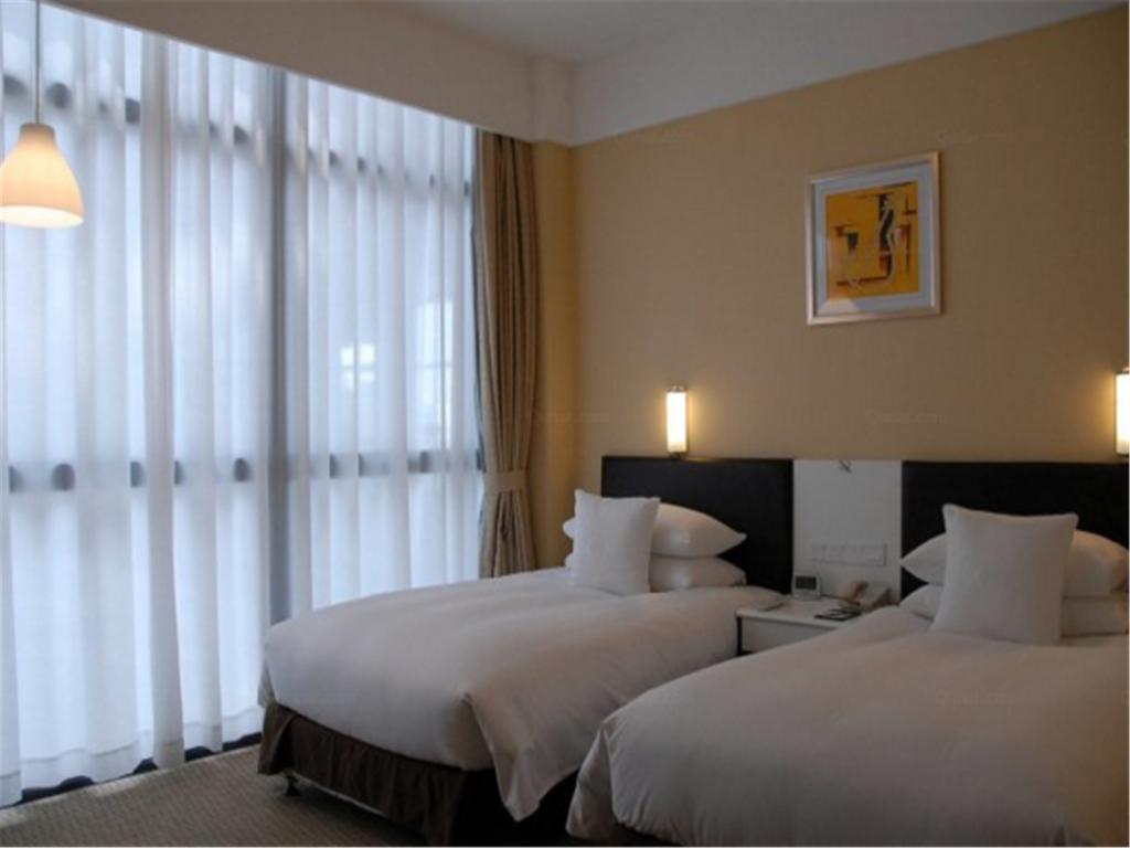 Gloria Plaza Hotel Kangqiao Shanghai Exterior foto