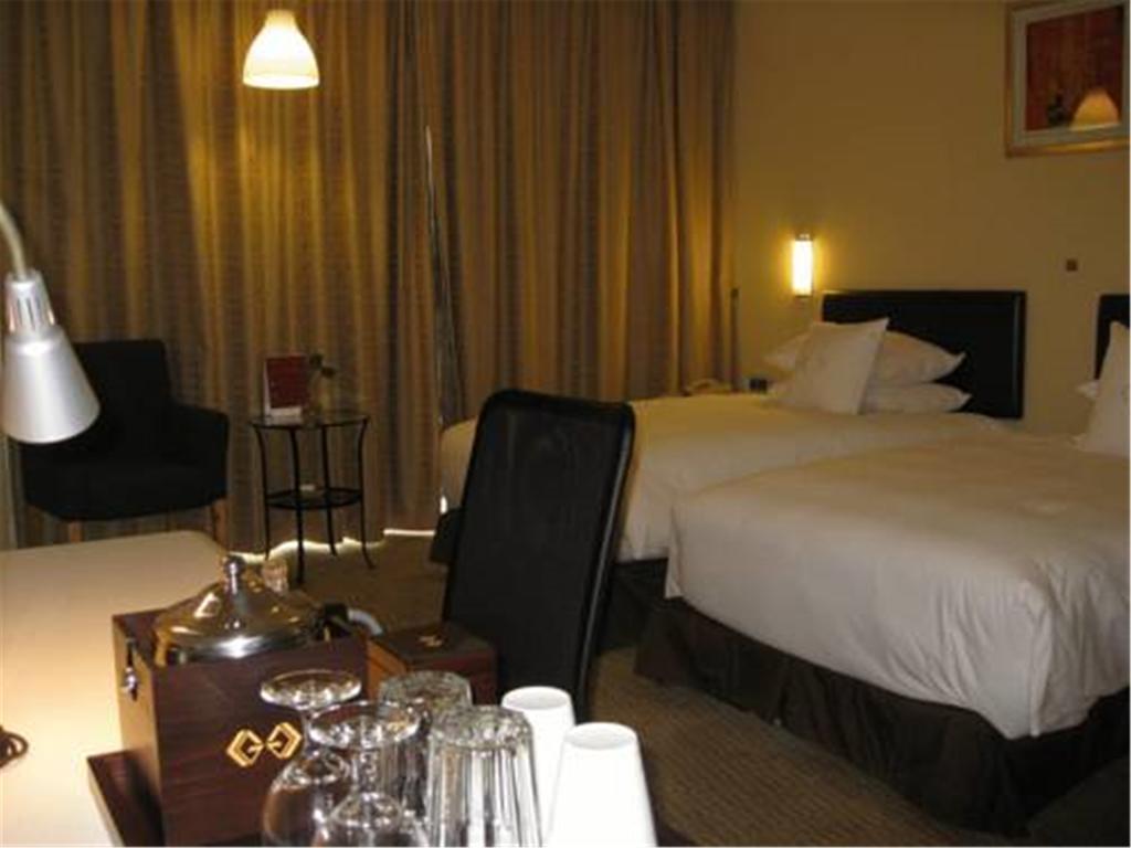 Gloria Plaza Hotel Kangqiao Shanghai Exterior foto