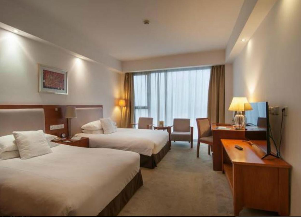 Gloria Plaza Hotel Kangqiao Shanghai Exterior foto