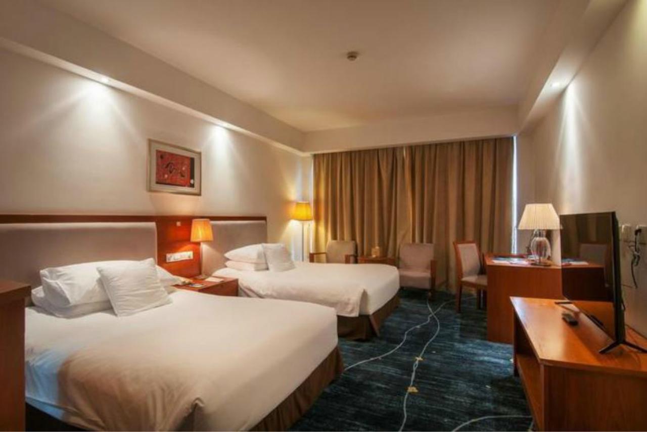 Gloria Plaza Hotel Kangqiao Shanghai Exterior foto