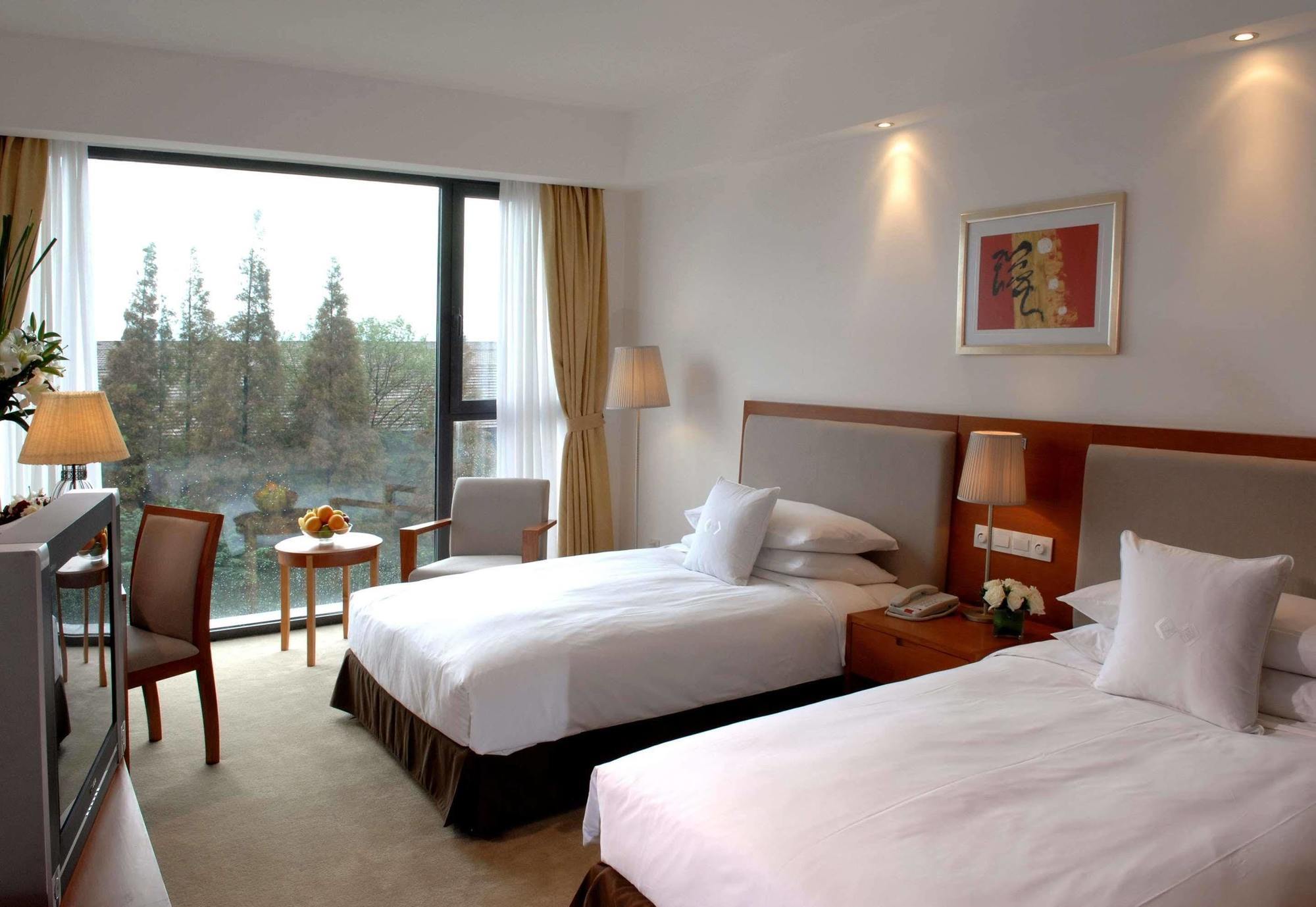 Gloria Plaza Hotel Kangqiao Shanghai Exterior foto